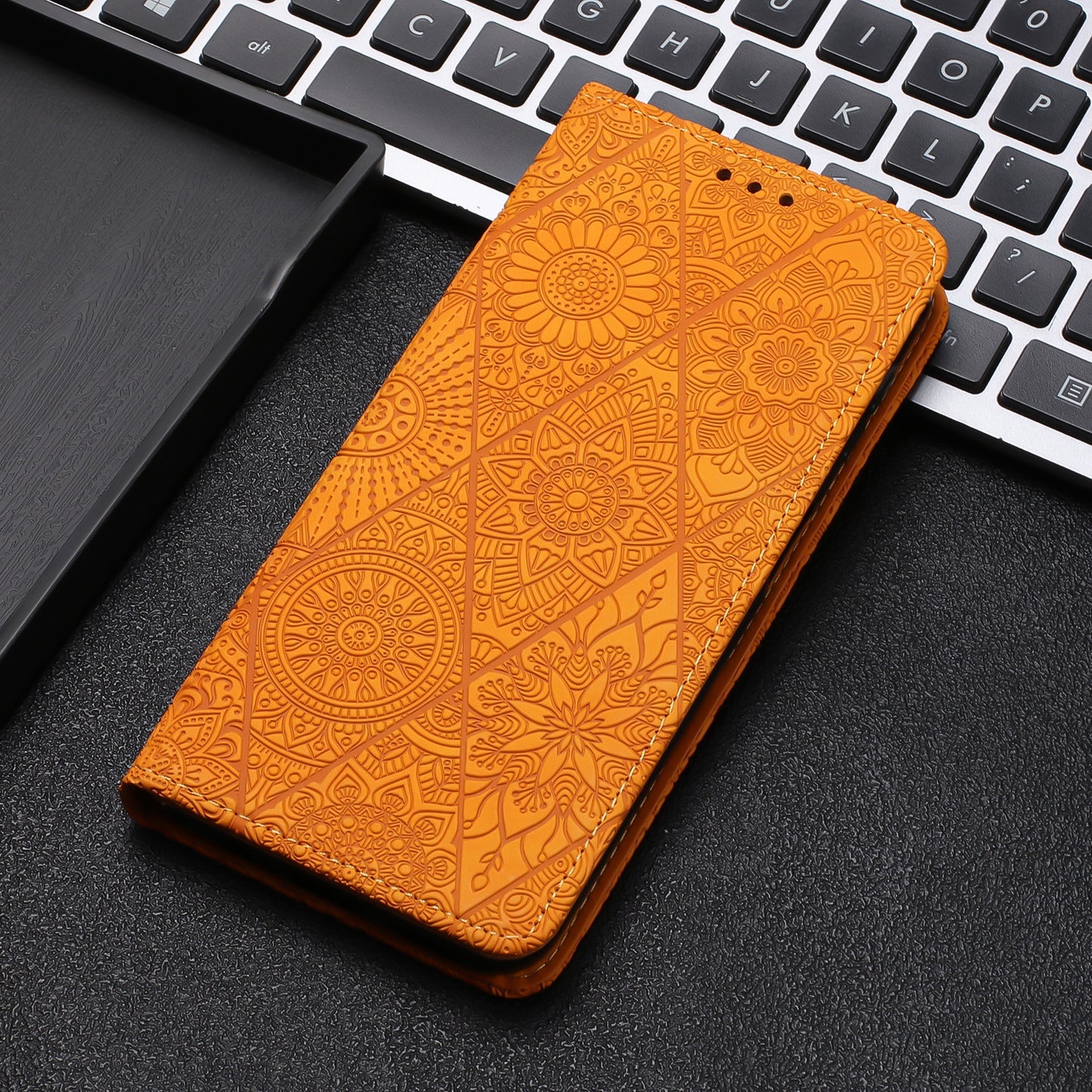 For iPhone 15 Plus Ethnic Embossed Adsorption Leather Phone Case