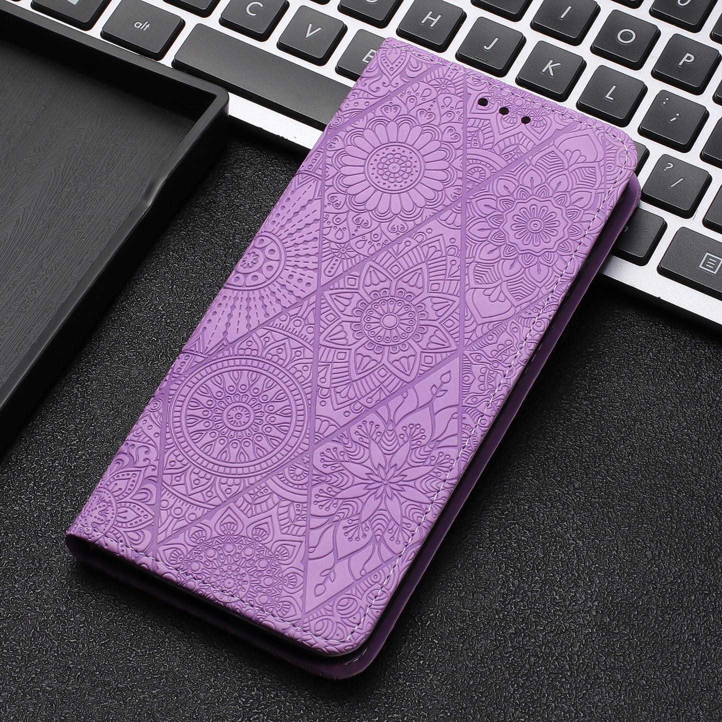 For iPhone 15 Plus Ethnic Embossed Adsorption Leather Phone Case