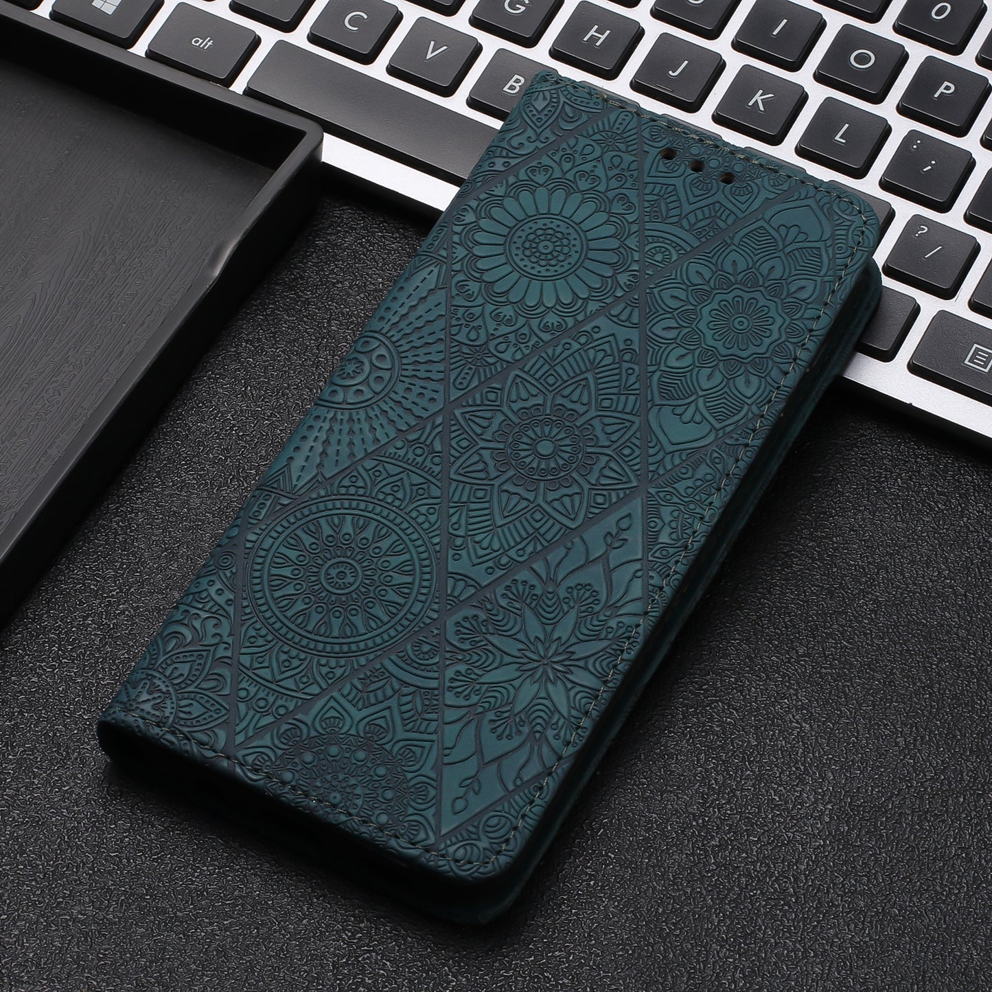 For iPhone 15 Plus Ethnic Embossed Adsorption Leather Phone Case